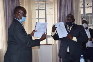 The signing of the contract for the Uganda Driver Licensing System between Ministry of Works & Transport and Uganda Security Printing Company (USPC)