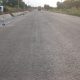 A section of the Yumbe–Moyo Road laid with Asphalt Concrete (AC 20), covering 21.61 km (21%) of the 103.08 km road project.